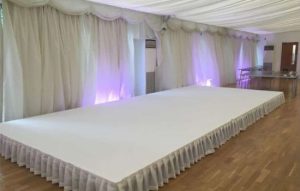 12' x 24' White Stage Rental